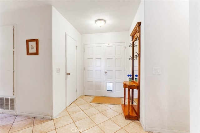 interior space with light tile patterned flooring