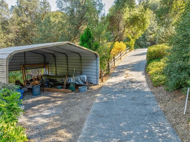 39309 Forest Park Ln, Oakhurst, CA 93644 - view of car parking with a detached carport