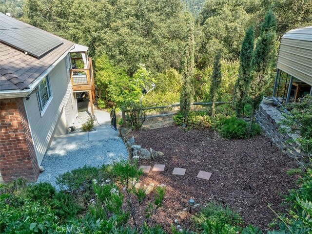 39309 Forest Park Ln, Oakhurst, CA 93644 - view of yard featuring fence and a view of trees