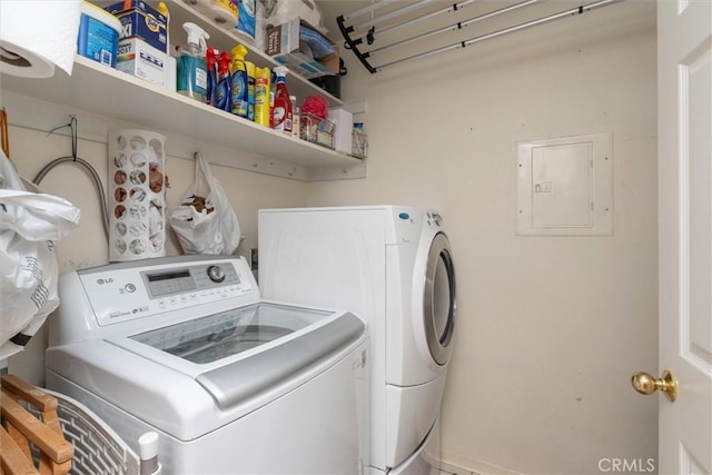 39309 Forest Park Ln, Oakhurst, CA 93644 - laundry room with electric panel, laundry area, and separate washer and dryer