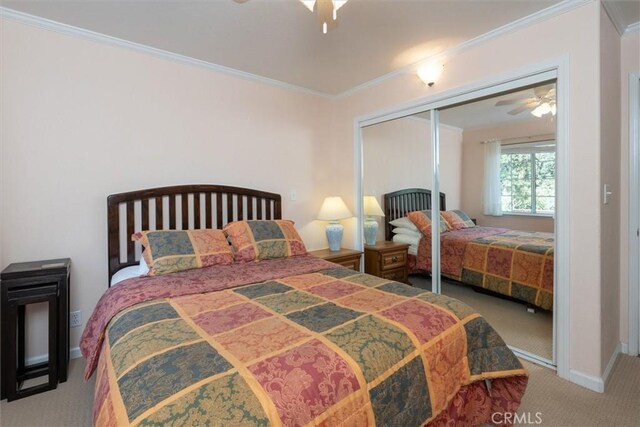 39309 Forest Park Ln, Oakhurst, CA 93644 - bedroom with carpet flooring, crown molding, a closet, and ceiling fan