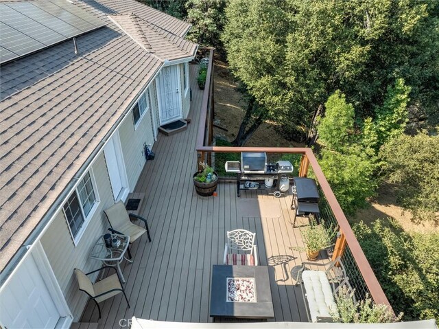 39309 Forest Park Ln, Oakhurst, CA 93644 - wooden deck with grilling area