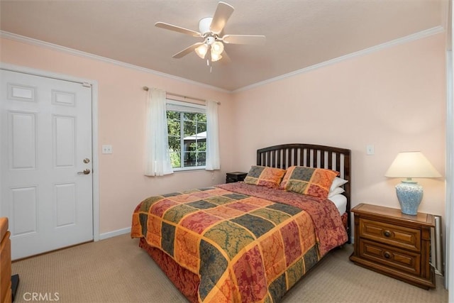 39309 Forest Park Ln, Oakhurst, CA 93644 - bedroom featuring ceiling fan, ornamental molding, carpet flooring, and baseboards