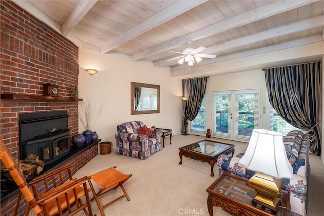 39309 Forest Park Ln, Oakhurst, CA 93644 - carpeted living area with beamed ceiling, ceiling fan, and wood ceiling