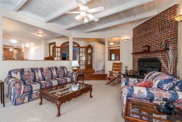 39309 Forest Park Ln, Oakhurst, CA 93644 - carpeted living room featuring wooden ceiling, beam ceiling, and a ceiling fan