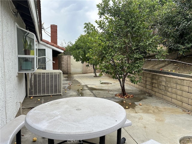 view of patio with central AC unit