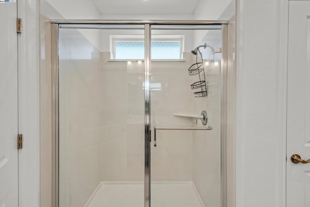 bathroom featuring walk in shower