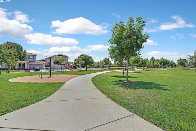 view of community featuring a yard