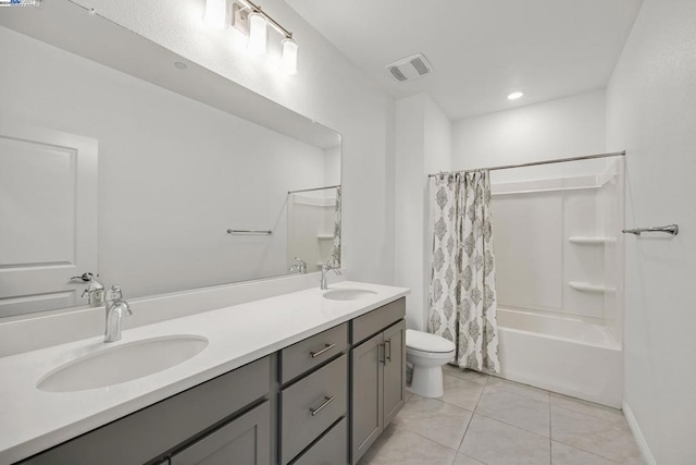 full bathroom featuring shower / bath combination with curtain, tile patterned flooring, vanity, and toilet