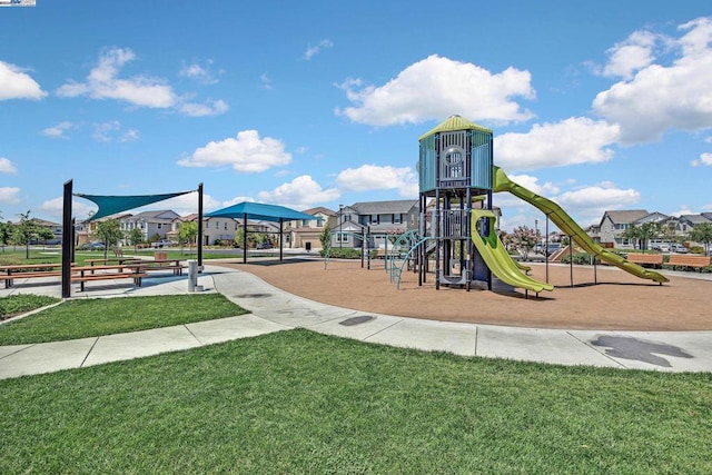 view of jungle gym with a lawn