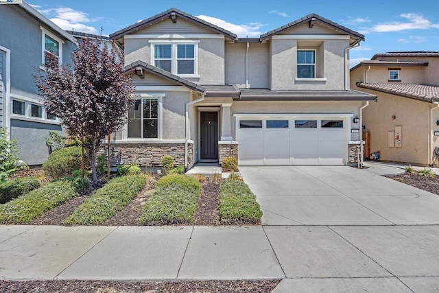 view of front of home with a garage