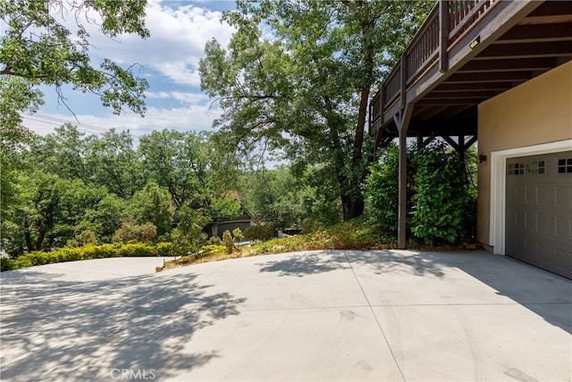 view of patio featuring a garage