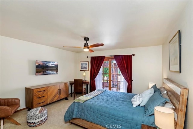 carpeted bedroom with ceiling fan and access to outside