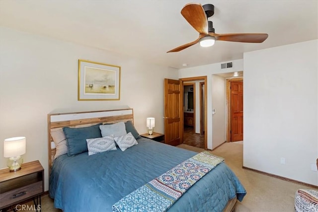 carpeted bedroom featuring ceiling fan