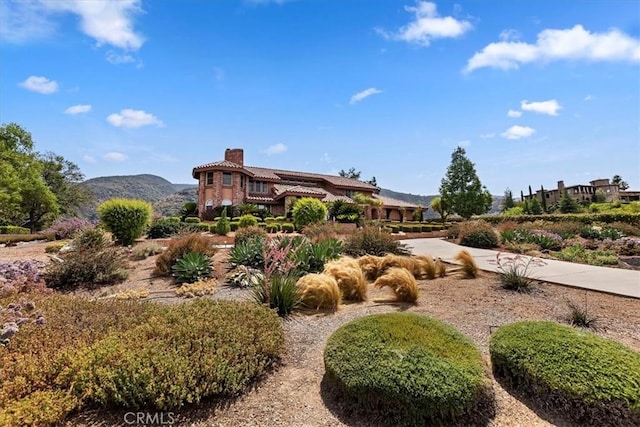 exterior space with a mountain view