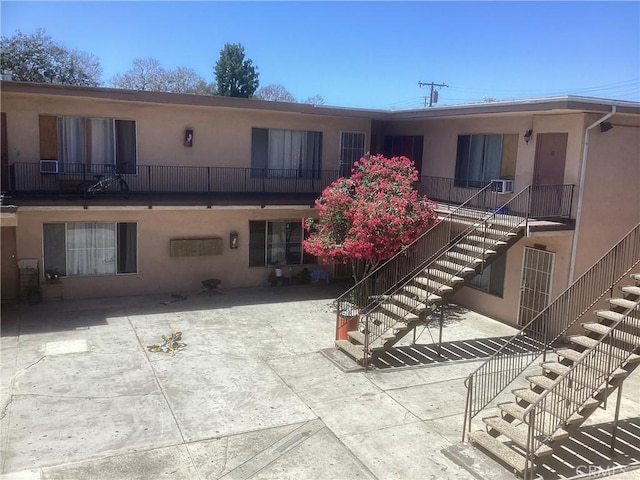 view of property with stairs