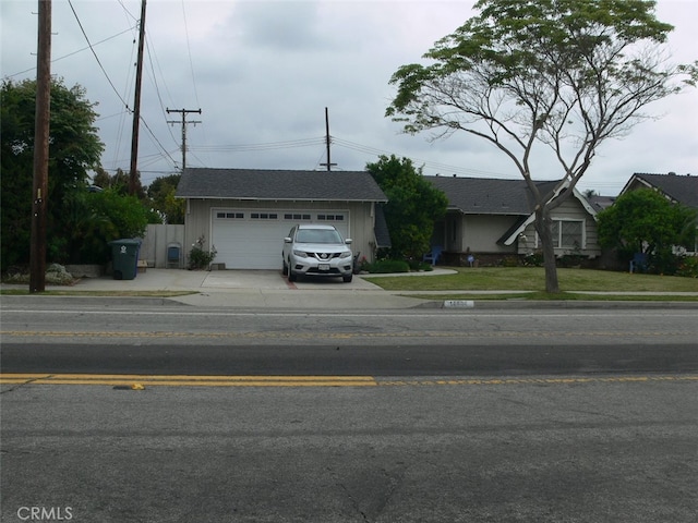 single story home with a garage