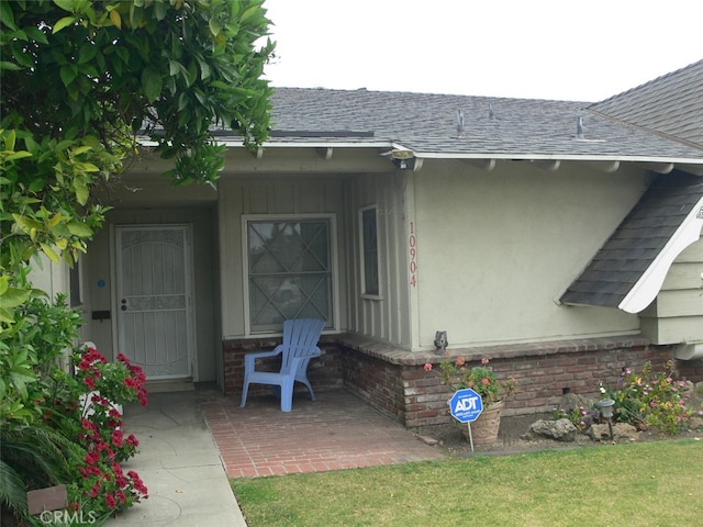 entrance to property with a patio area