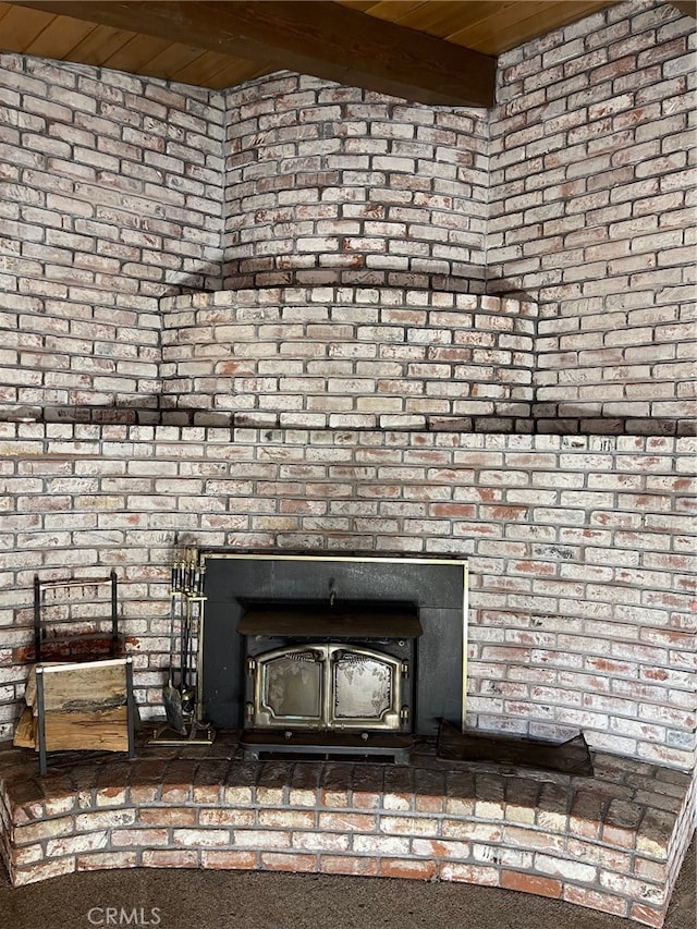 details featuring wood ceiling and beam ceiling