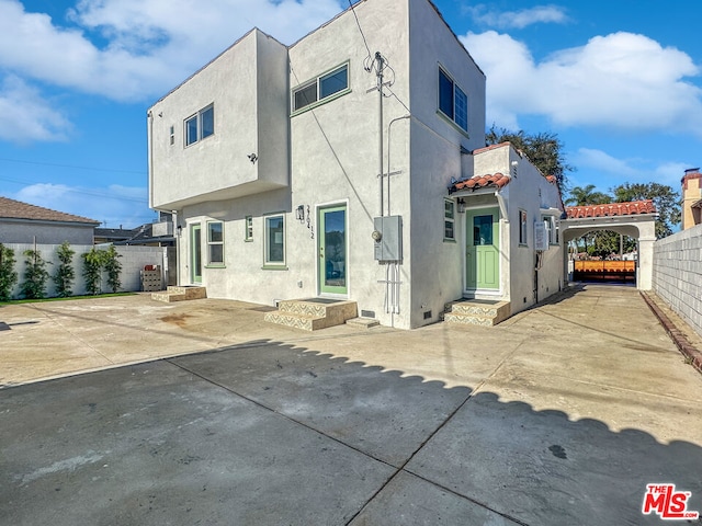 rear view of property with a patio area