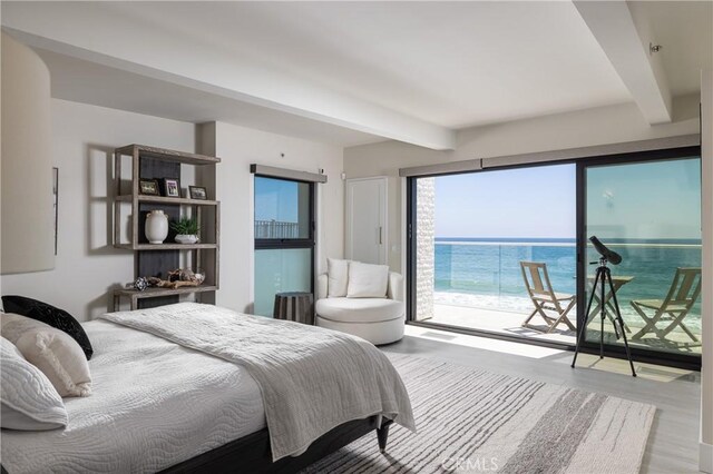 35651 Beach Rd, Dana Point, CA 92624 - bedroom featuring beamed ceiling, access to exterior, and wood finished floors