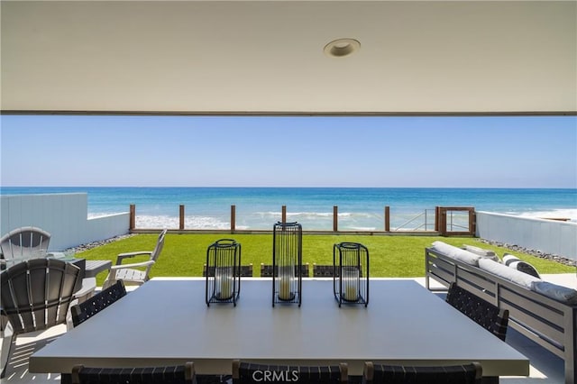 35651 Beach Rd, Dana Point, CA 92624 - view of patio featuring view of water and beach and outdoor dining space
