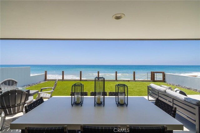 35651 Beach Rd, Dana Point, CA 92624 - view of patio / terrace featuring view of water and beach and outdoor dining space