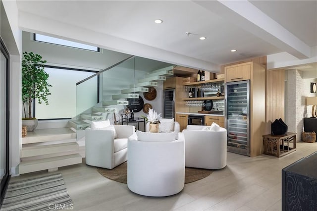 35651 Beach Rd, Dana Point, CA 92624 - living room featuring wine cooler, stairs, bar, light wood-style flooring, and recessed lighting