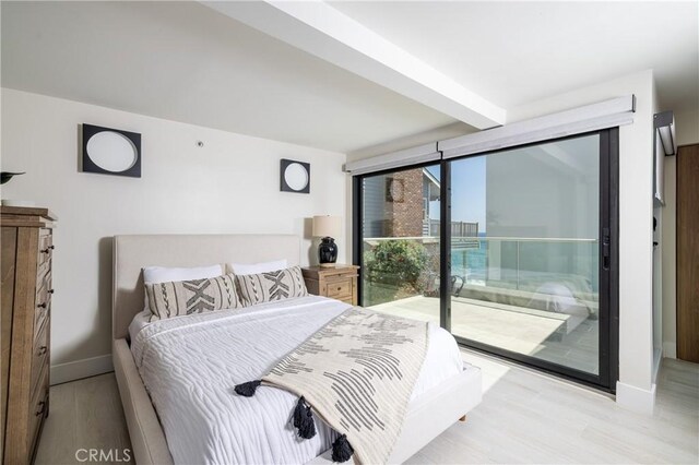 35651 Beach Rd, Dana Point, CA 92624 - bedroom with access to outside, baseboards, and wood finished floors