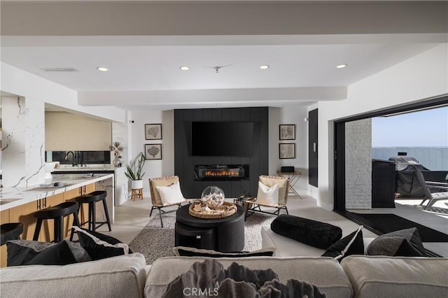 35651 Beach Rd, Dana Point, CA 92624 - living room featuring recessed lighting and a large fireplace