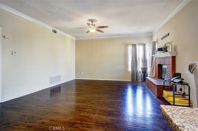 living room featuring ornamental molding, a brick fireplace, ceiling fan, and dark wood-type flooring