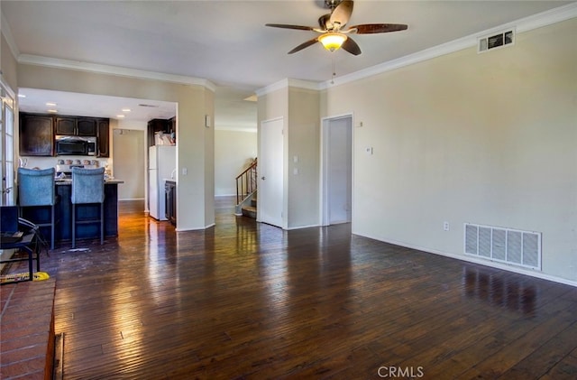 living room featuring crown molding, dark hardwood / wood-style flooring, and ceiling fan