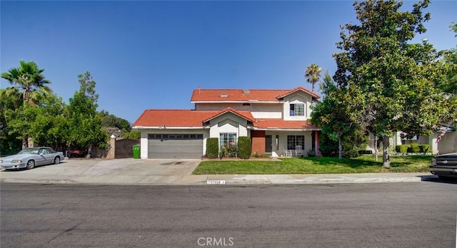 front facade with a garage and a front yard