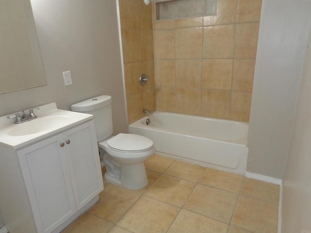 full bathroom featuring tile patterned floors, vanity, toilet, and tiled shower / bath