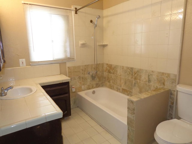 bathroom featuring tile patterned flooring, vanity, and toilet