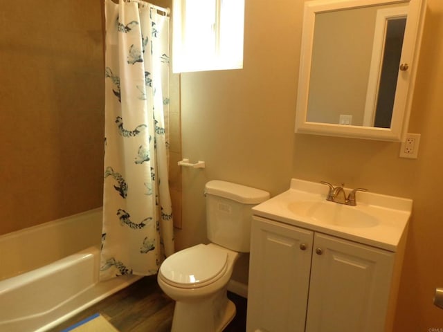 full bathroom with hardwood / wood-style flooring, shower / bath combination with curtain, toilet, and vanity