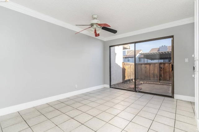 spare room with light tile patterned floors, a textured ceiling, ceiling fan, and ornamental molding