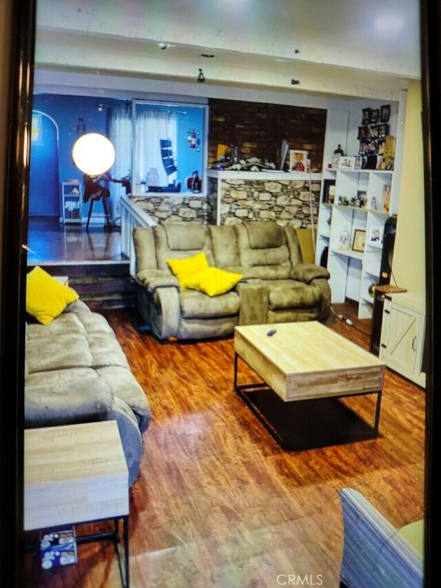 living room featuring wood-type flooring