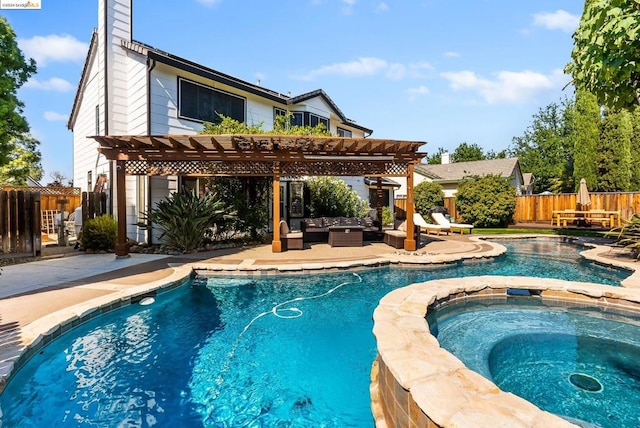 view of pool with an in ground hot tub, a pergola, an outdoor hangout area, and a patio area