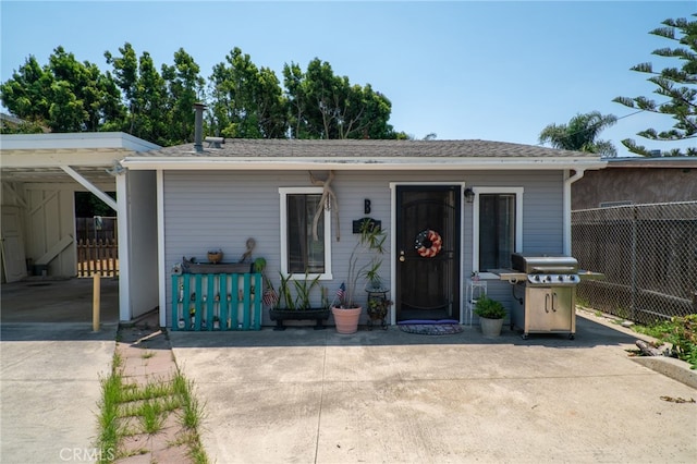 entrance to property with a patio area