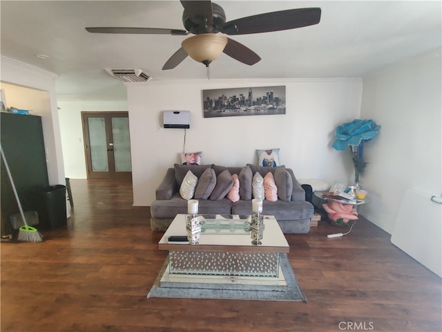 living room with ceiling fan, dark hardwood / wood-style floors, french doors, and crown molding