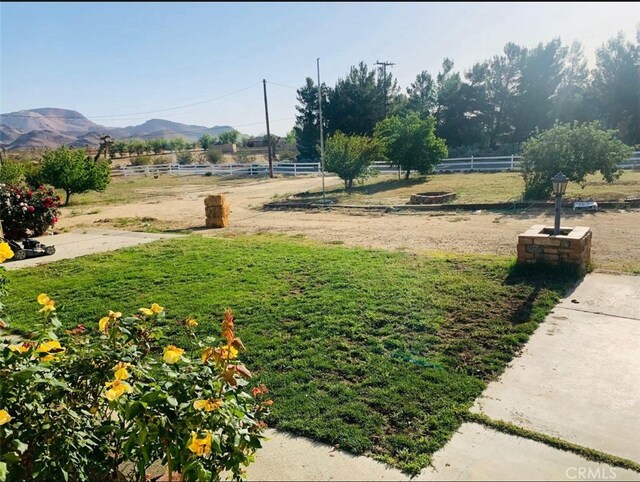 8043 Mojave Tropico Rd, Mojave, CA 93501 - view of yard with a mountain view and a rural view