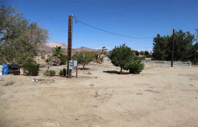8043 Mojave Tropico Rd, Mojave, CA 93501 - view of yard with a mountain view and a view of countryside