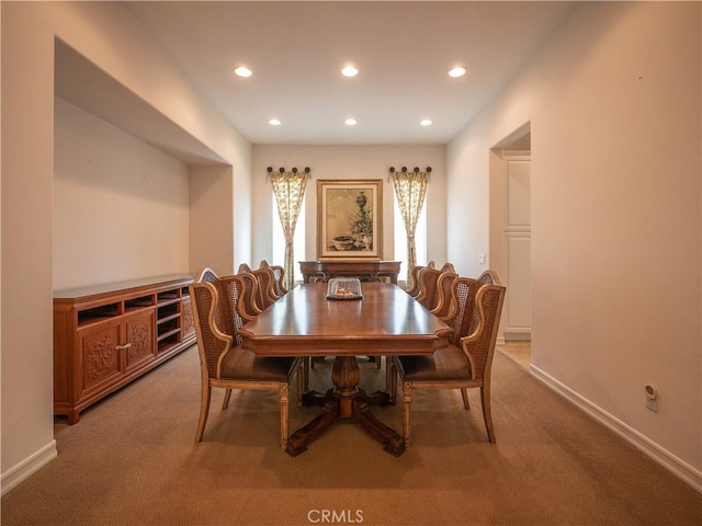 view of carpeted dining space