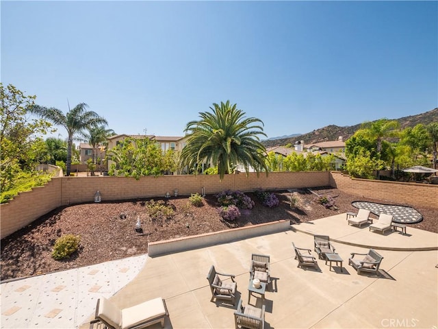 view of patio with a mountain view