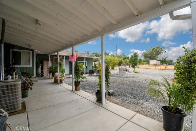 view of patio / terrace featuring central AC unit