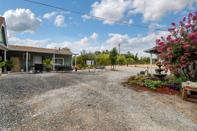 view of yard featuring a patio area