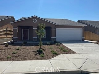 ranch-style home with a garage