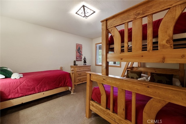 bedroom featuring carpet