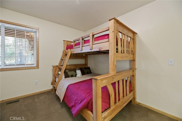 bedroom with carpet flooring, baseboards, and visible vents